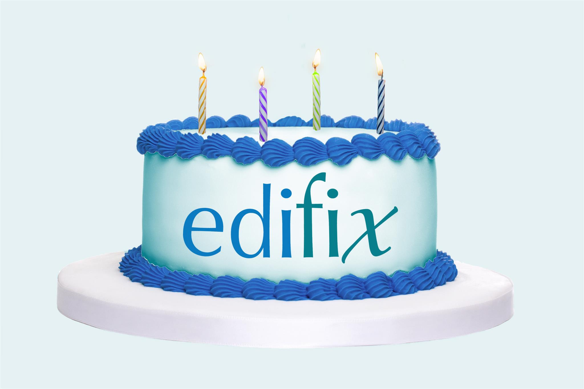 Birthday cake with 4 candles on top and "Edifix" on the side